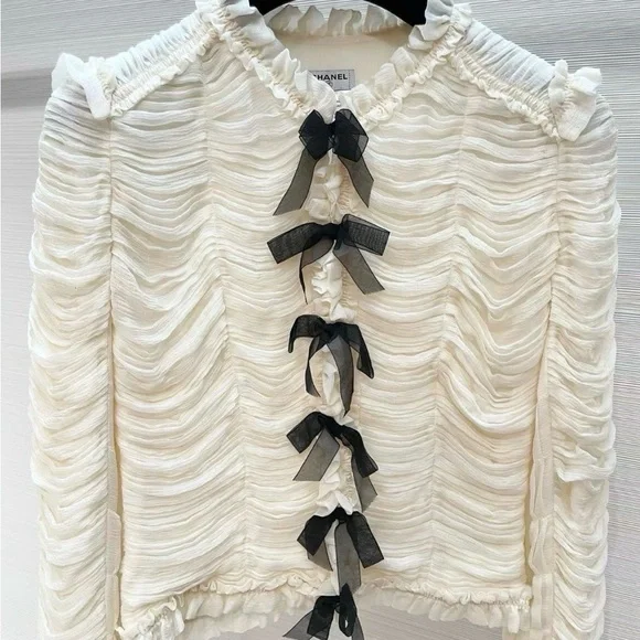 CHANEL Cream Ruffled Long-Sleeve Blouse with Black Bow Accents - Picture 5 of 7